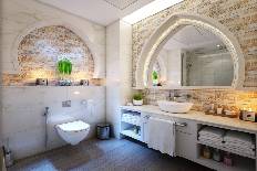 Editorial bathroom tile work — handmade subway and natural stone, Surface Tiling Ltd